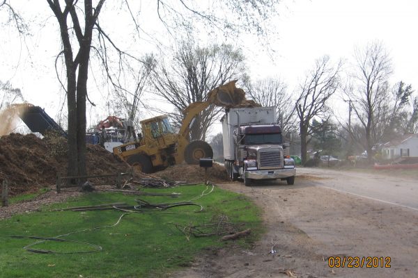Clearing debris after a tornado hit Dexter
