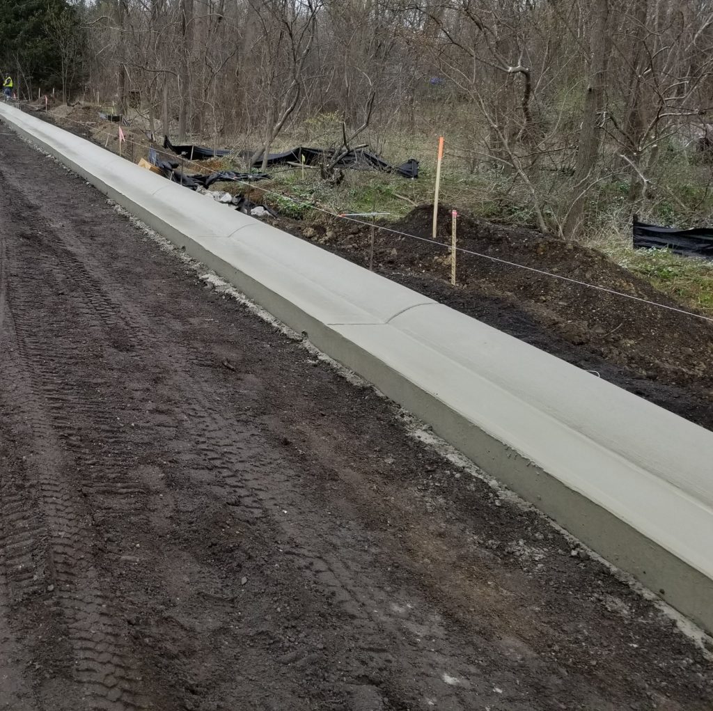 Curb going in on Ann Arbor-Saline Rd