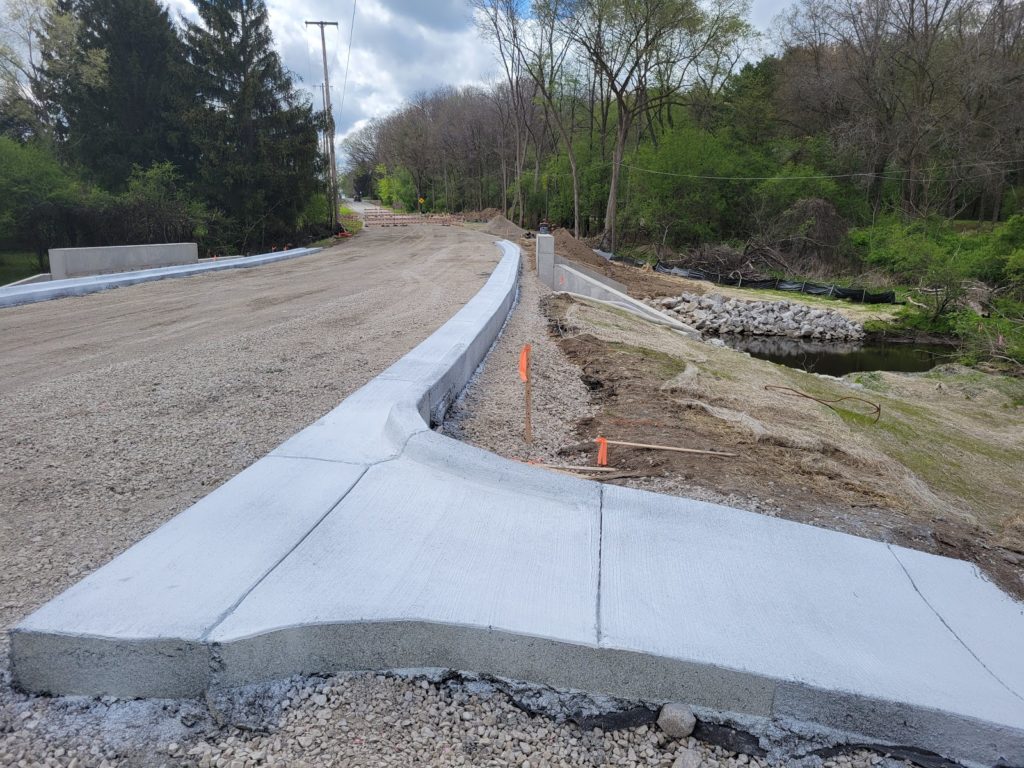 photo of new curb on Miller Rd at the bridge