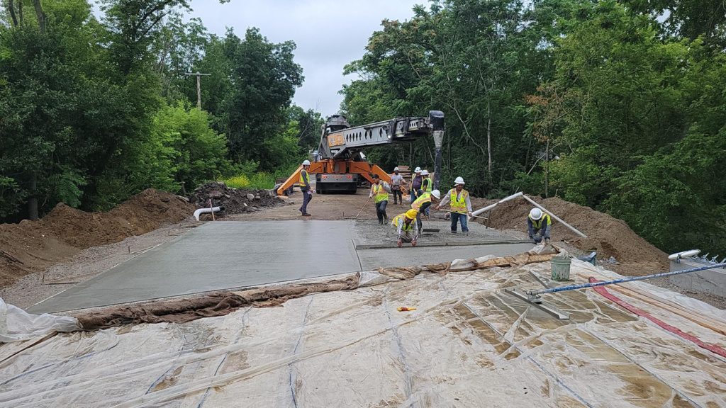 photo of concrete bridge approach being poured