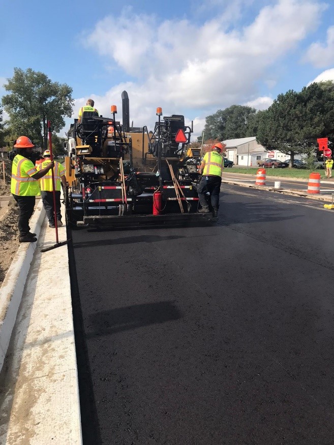 Paving equipment on Ecorse Rd
